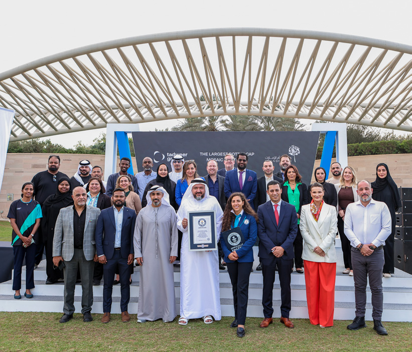 Tadweer Group receiving the Guinness World Record certificate